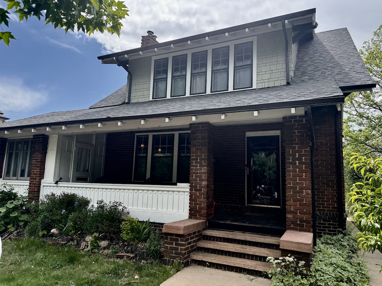 A classic 1910 bungalow with shed roof and wide porch